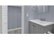 Bathroom with updated vanity, sink, and updated fixtures at 5942 Morgan Rd, Atlanta, GA 30340