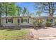 Charming single-story home with siding, a front porch, and a blooming bush at 5942 Morgan Rd, Atlanta, GA 30340