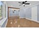Bright living room with hardwood floors and a view to another room at 5942 Morgan Rd, Atlanta, GA 30340