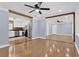 Spacious open floor plan featuring hardwood floors and a view to the kitchen at 5942 Morgan Rd, Atlanta, GA 30340
