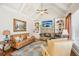 Comfortable living room featuring a stone fireplace, built-in shelving, and plush seating at 5945 Boulder Bluff Dr, Cumming, GA 30040