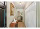 Inviting entryway with stylish accents and a view to the living area, complete with tiled floors at 8540 Ridge Rd, Fairburn, GA 30213