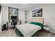 This bedroom features a modern desk and a built-in shelf for extra storage at 2965 Pharr Court South Nw # 304, Atlanta, GA 30305
