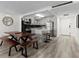 A modern kitchen with stainless steel appliances and a kitchen island provides easy access to the dining area at 2965 Pharr Court South Nw # 304, Atlanta, GA 30305