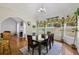 Dining room with ample natural light and backyard views at 3070 Glad Dale Se Dr, Conyers, GA 30094