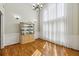 Bright dining room featuring a display cabinet and a large window, offering natural light and views at 3070 Glad Dale Se Dr, Conyers, GA 30094