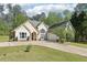 Lovely single-Gathering home with well-maintained lawn, paved driveway and attached two car garage at 3070 Glad Dale Se Dr, Conyers, GA 30094