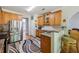 Kitchen boasts granite counters, stainless steel appliances, and breakfast bar seating at 3070 Glad Dale Se Dr, Conyers, GA 30094