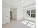 Inviting bedroom bathed in natural light with an ensuite bathroom and generous space at 5816 Creek Indian Dr, Sugar Hill, GA 30518