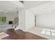 Open-concept living space with a fireplace, high ceilings, and hardwood floors, providing ample natural light at 5816 Creek Indian Dr, Sugar Hill, GA 30518