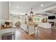 Open kitchen concept flows to the dining & living areas, great for entertaining guests at 110 White Oak Trl, Cumming, GA 30028