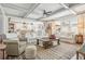 Inviting living room featuring coffered ceilings, an open floorplan, and neutral tones at 110 White Oak Trl, Cumming, GA 30028
