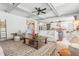Bright living room with coffered ceilings open to kitchen, perfect for entertaining at 110 White Oak Trl, Cumming, GA 30028