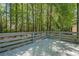 Spacious back deck with wooded views offers a serene spot for outdoor relaxation and entertaining at 1331 Windage Sw Ct, Marietta, GA 30008