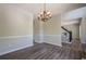 Formal dining room boasting stylish flooring, a modern chandelier, and easy access to other rooms at 1331 Windage Sw Ct, Marietta, GA 30008