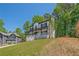 Picturesque two-story home with a charming front porch and a beautifully landscaped yard at 1331 Windage Sw Ct, Marietta, GA 30008