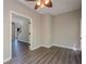Bright living space with hard surface flooring and neutral walls showcases a glimpse of the staircase at 1331 Windage Sw Ct, Marietta, GA 30008