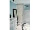 Well-lit bathroom features a modern vanity, a full mirror, and a stylish walk-in shower at 153 Helen Rd, Covington, GA 30016