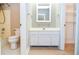 Bathroom featuring a vanity with storage and a shower/tub combination at 407 Coleraine Se, Smyrna, GA 30080