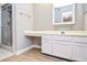 Bathroom featuring a vanity, shower and luxury vinyl flooring at 407 Coleraine Se, Smyrna, GA 30080