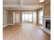 Bright living room boasts wood floors, fireplace, and an airy, open feel at 407 Coleraine Se, Smyrna, GA 30080