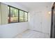 Bright patio area with tile floor and view to the backyard at 407 Coleraine Se, Smyrna, GA 30080