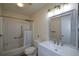 This bathroom features a modern vanity, brushed nickel fixtures, shower with safety bar, and neutral tones at 475 Mount Vernon Ne Hwy # C-220, Sandy Springs, GA 30328