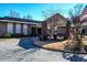 Inviting brick building featuring well-maintained landscaping, offering a welcoming facade at 475 Mount Vernon Ne Hwy # C-220, Sandy Springs, GA 30328