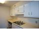 Functional kitchen equipped with stainless steel appliances and ample counter space for meal preparation at 475 Mount Vernon Ne Hwy # C-220, Sandy Springs, GA 30328