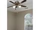 Neutral bedroom with ceiling fan and window with natural light at 1234 W Wylie Bridge Rd, Woodstock, GA 30188