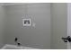 Empty laundry room area, ready to accommodate washing machines and dryers at 1234 W Wylie Bridge Rd, Woodstock, GA 30188