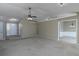 Spacious living room featuring high ceilings and natural light, showcasing its potential at 1234 W Wylie Bridge Rd, Woodstock, GA 30188