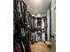 Walk-in closet with custom shelving and ample storage space for clothing and accessories at 3147 Pine Needle Sw Ct, Lilburn, GA 30047