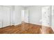 This airy bedroom includes hardwood floors and a closet for a relaxing and practical space at 8298 Holly Dr, Jonesboro, GA 30238