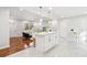 Bright and open kitchen featuring a large island and white countertops at 8298 Holly Dr, Jonesboro, GA 30238
