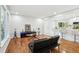 Spacious living room with hardwood floors and open floor plan at 8298 Holly Dr, Jonesboro, GA 30238