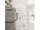 Close up of new hot water heater in utility room with utility hookups nearby at 8298 Holly Dr, Jonesboro, GA 30238