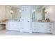 Bright bathroom featuring double vanities with granite countertops, modern fixtures, and ample storage space at 925 Sunny Meadows Ln, Marietta, GA 30062