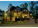 Beautiful two-story brick home with lush green lawn and tasteful landscaping at 925 Sunny Meadows Ln, Marietta, GA 30062