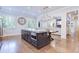 Open-concept kitchen with a large island, a built-in microwave, and hardwood flooring at 925 Sunny Meadows Ln, Marietta, GA 30062