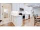 Bright, white kitchen featuring stainless steel appliances, hardwood floors and modern finishes at 925 Sunny Meadows Ln, Marietta, GA 30062