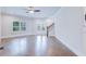 Open-concept living area with hardwood floors, natural light and a staircase at 925 Sunny Meadows Ln, Marietta, GA 30062