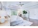 Tranquil main bedroom with soft lighting, tray ceilings, and views of the outdoor landscape at 925 Sunny Meadows Ln, Marietta, GA 30062