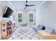 ' playroom featuring a TV, dollhouse, table, and play sofa at 925 Sunny Meadows Ln, Marietta, GA 30062