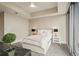 Comfortable bedroom showcasing a ceiling fan and natural light, ideal for restful nights at 1065 Peachtree Ne St # 2803, Atlanta, GA 30309