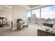 Bedroom with a work-from-home setup and views of the city at 1065 Peachtree Ne St # 2803, Atlanta, GA 30309