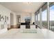 Stylish living room with modern fireplace, city views, and open floor plan at 1065 Peachtree Ne St # 2803, Atlanta, GA 30309