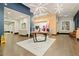 Open retail space with modern lighting, hardwood floors, and ample display area for merchandise at 1065 Peachtree Ne St # 2803, Atlanta, GA 30309