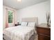 Cozy bedroom featuring a neutral color scheme, soft lighting, and comfortable furnishings at 4568 Mantova Dr, Buford, GA 30519