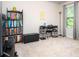 Spare bedroom with a desk, bookshelf, and comfortable seating area at 4568 Mantova Dr, Buford, GA 30519